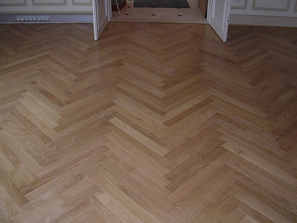 Cireuse parquet en fonte Normandie butée de porte