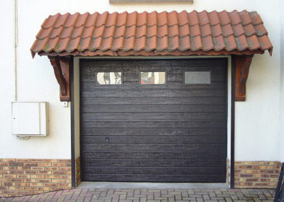 Porte de garage sectionnelle, laqué bronze